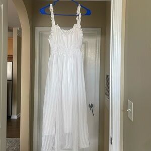 Pretty all white dress. Perfect for all white events.